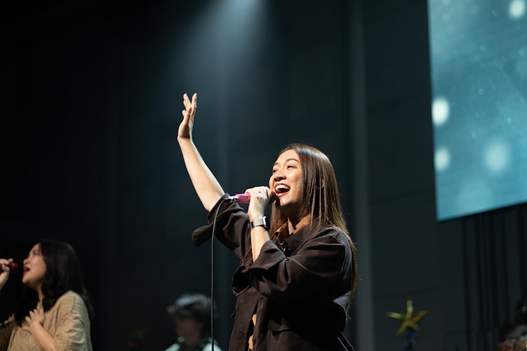 person speaking confidently on stage
