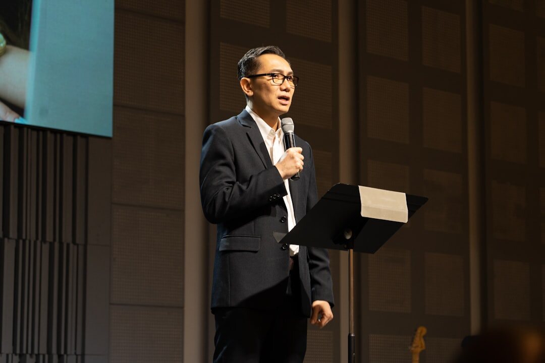 person speaking confidently on stage