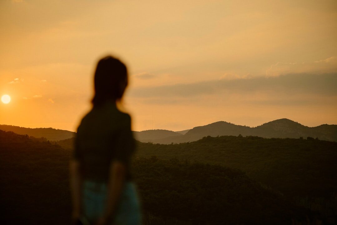 person reflecting alone in nature