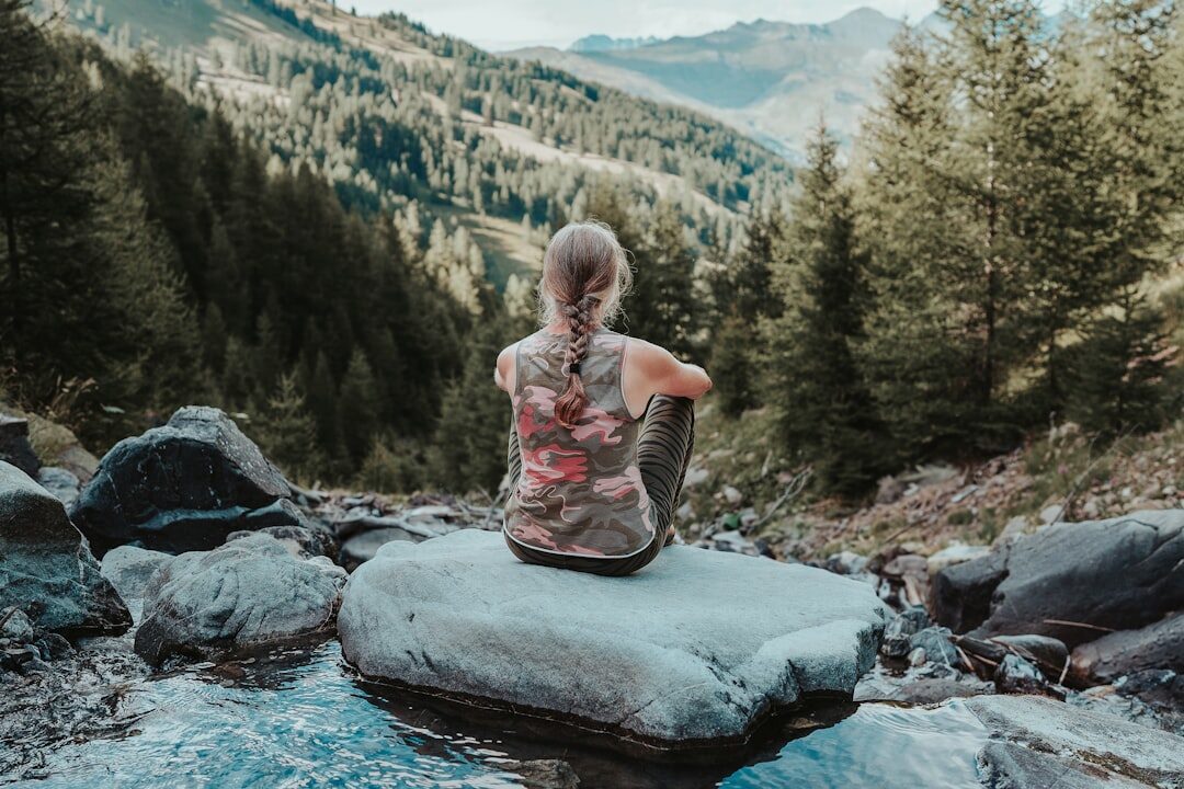 person reflecting alone in nature