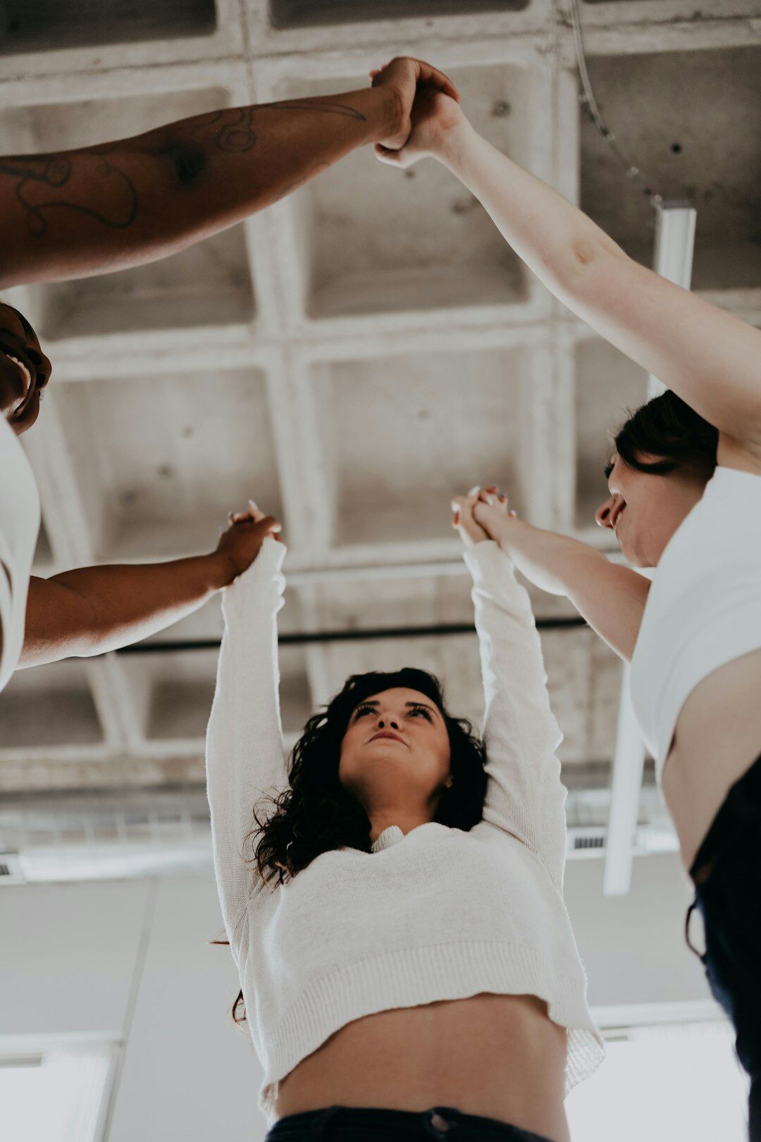 Diverse group of people celebrating teamwork and growth