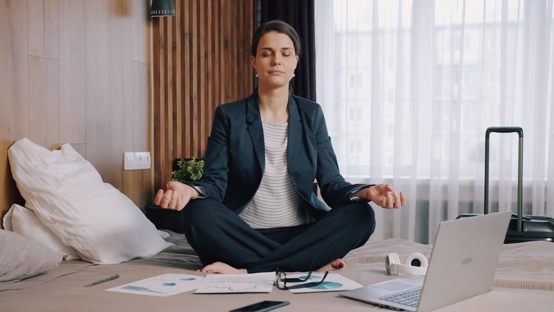 person meditating in calm room